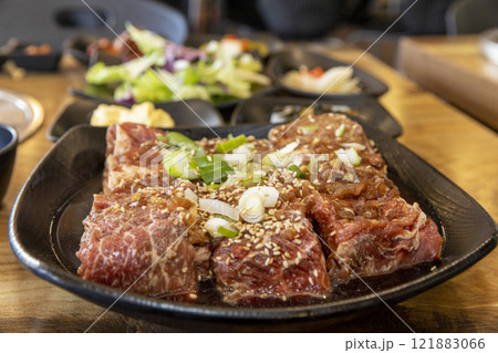 Korean BBQ. Seasoned beef ribs Korean BBQ. Seasoned beef ribs 121883066