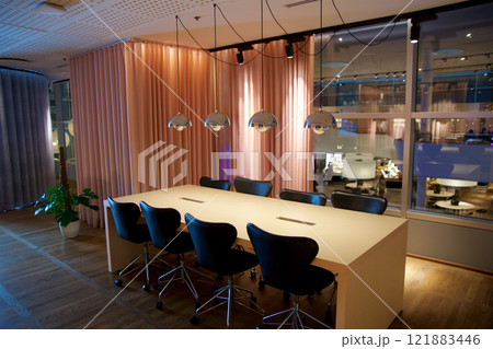 Copenhagen, Denmark, November 24, 2018: Spacious Work Area with a Large Table and Eight Seats, Featuring Power Outlets in the Frequent Flyer Lounge 121883446