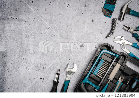 Set of tools on concrete background, Set of tools on concrete background, 121883904