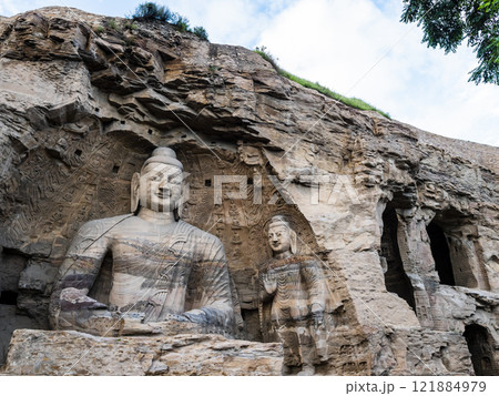Stunning giant Buddha in Yungang grottoes, ancient buddhist temple in Datong, Shanxi province, China 121884979