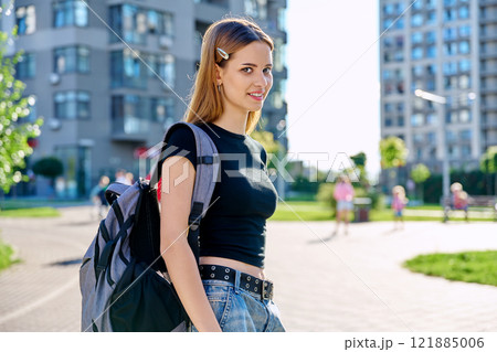 Outdoor portrait young teenager student female with backpack Outdoor portrait young teenager student female with backpack 121885006