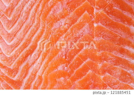 Texture background of fresh raw salmon or trout sea fish fillet macro, close up, top view. Texture background of fresh raw salmon or trout sea fish fillet macro, close up, top view. 121885451