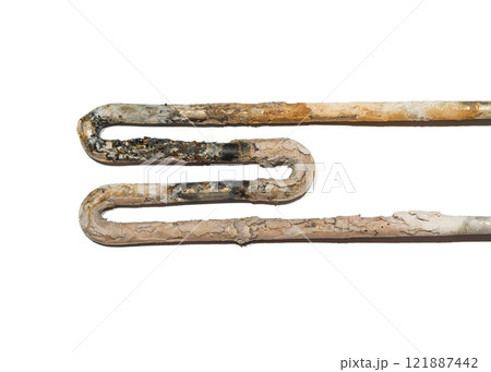 Corroded Water Heater Element with Lime Scale Deposits isolated on white 121887442