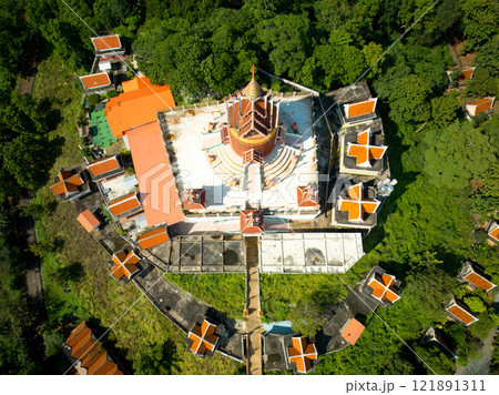 Explore the stunning architecture of Wat Khao Phrom Sawan in Saraburi, Thailand surrounded by lush greenery Explore the stunning architecture of Wat Khao Phrom Sawan in Saraburi, Thailand surrounded by lush greenery 121891311