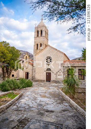 Orthodox Rezevici monastery near the Adriatic sea in Montenegro Orthodox Rezevici monastery near the Adriatic sea in Montenegro 121896326