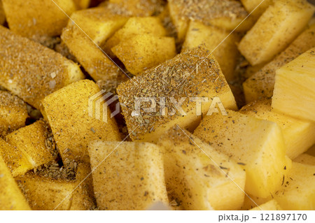 orange pumpkin fruit details cut into pieces for cooking 121897170