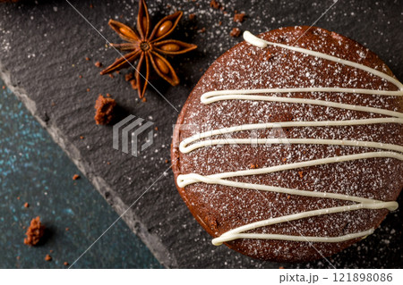 Whoopie pie with orange cream. Delicious homemade dessert 121898086
