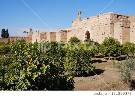 Gate and walls of El Badi palace and stork's nests in Marrakech city in Morocco 121899378