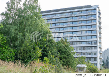 Abandoned sanatorium. Conserved multi-storey building with windows and balconies. Modernism in architecture of the 1960s. Ukraine, Truskavets resort. Abandoned sanatorium. Conserved multi-storey building with windows and balconies. Modernism in architecture of the 1960s. Ukraine, Truskavets resort. 121900461