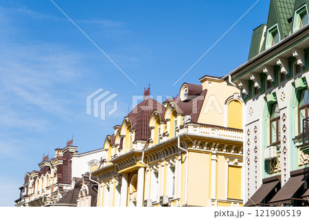 Facade of colorful house. Residential buildings. Bright windows. Balcony modern architecture. Facade of colorful house. Residential buildings. Bright windows. Balcony modern architecture. 121900519