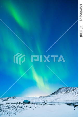 Aurora Borealis in Scandinavia. Norway, Lofoten islands. Northern lights over the mountains. Aurora Borealis in Scandinavia. Norway, Lofoten islands. Northern lights over the mountains. 121900854