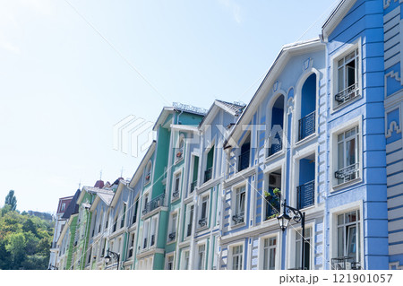 Blue green color modern exterior of Houses Buildings. Bright windows 121901057