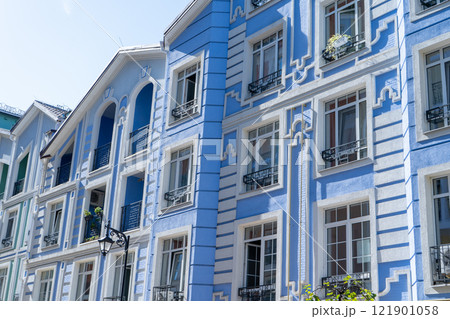 Blue color modern exterior of Houses Buildings. Bright windows and balcony Blue color modern exterior of Houses Buildings. Bright windows and balcony 121901058