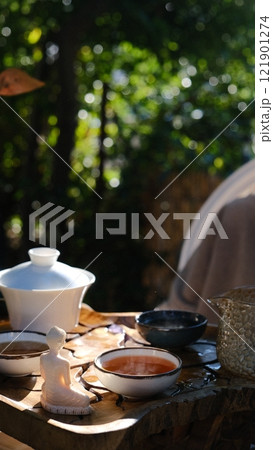 Tea ceremony outdoor in summer 121901274