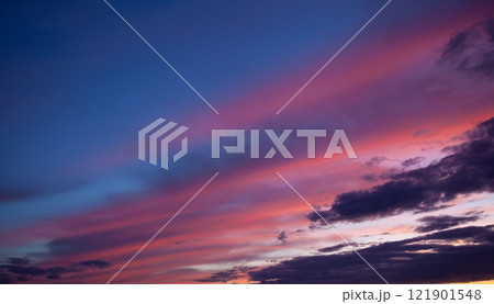 Multi-colored clouds on the dramatic sky. Consumption and sunset clouds. Natural landscape 121901548