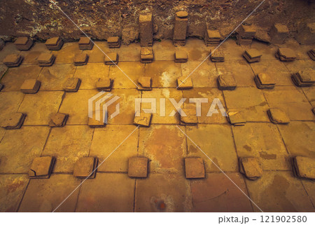 Ancient ruins of Pompei city, Naples, Italy. Floor structure construction of Pompeii thermal bath. Ancient ruins of Pompei city, Naples, Italy. Floor structure construction of Pompeii thermal bath. 121902580
