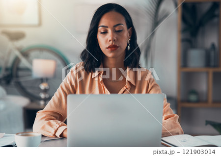 Elegant, professional and freelance worker on her laptop inside home office. Formal, stylish and fashionable corporate employee online. Remote, communication and sending emails in digital workplace. Elegant, professional and freelance worker on her laptop inside home office. Formal, stylish and fashionable corporate employee online. Remote, communication and sending emails in digital workplace. 121903014