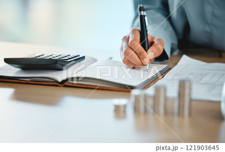 Closeup of auditor, banker and business finance accountant hands analyzing, calculating and recording tax calculations. Woman working on calculator to manage budget saving payments and expenses. 121903645