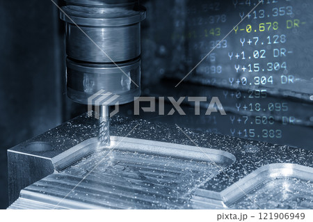 Abstract scene the CNC milling machine cutting mold part and G-code data back ground. 121906949