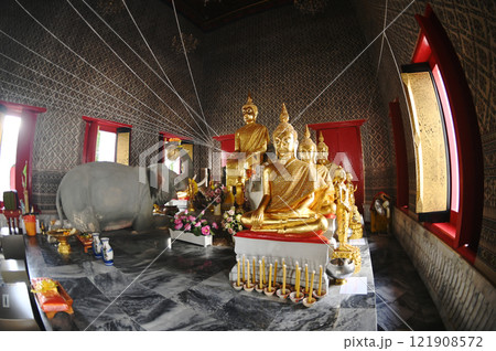 Wat Nang Chi Chotikaram have Buddha image in the meditation posture is enshrined. Surrounded by several Buddha images, behind the main Buddha image is a reclining Buddha image.  121908572