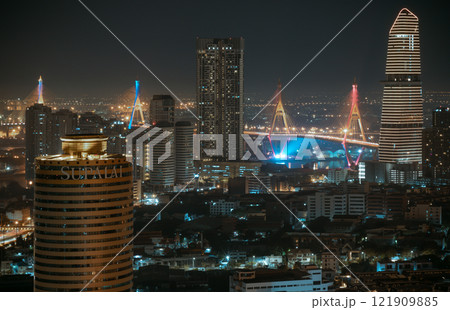 Night view after sunset of Skyscrapers in the business district and Bhumibol Bridge. 121909885