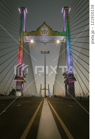 Stunning scenery of Thotsamarachan Bridge or King Rama X Bridge crossing Chao phraya river with evening sky. 121910138