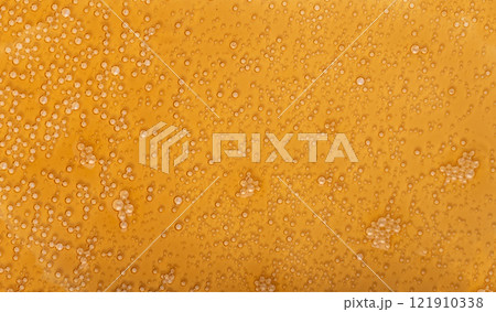 Spilled soda texture, soft drink puddle, liquid stain, beer splatter, brown sparkling water with bubbles 121910338