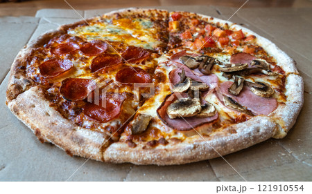 Four Seasons Pizza, Quattro Stagioni with 4 Types of Toppings with Salami, Tomato, Mushrooms,Meat Four Seasons Pizza, Quattro Stagioni with 4 Types of Toppings with Salami, Tomato, Mushrooms,Meat 121910554