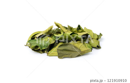 Thai lime dried leaves isolated, makrut lime or Citrus hystrix leaf pile, kaffir lime dry sprouts, Asia spices Thai lime dried leaves isolated, makrut lime or Citrus hystrix leaf pile, kaffir lime dry sprouts, Asia spices 121910910