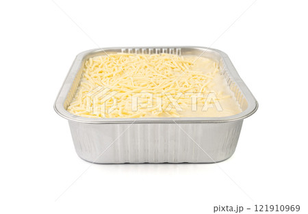 Lasagna portion in aluminium foil tray isolated. Oven baked lasagne for heating, container, airplane food Lasagna portion in aluminium foil tray isolated. Oven baked lasagne for heating, container, airplane food 121910969
