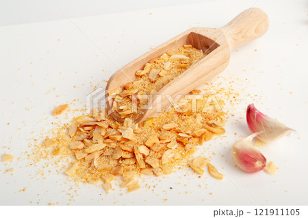 Dry Garlic Slices, Crispy Fried Cloves Pile Closeup, Roasted Grilled Garlic Flakes, Clove Chip Group Dry Garlic Slices, Crispy Fried Cloves Pile Closeup, Roasted Grilled Garlic Flakes, Clove Chip Group 121911105