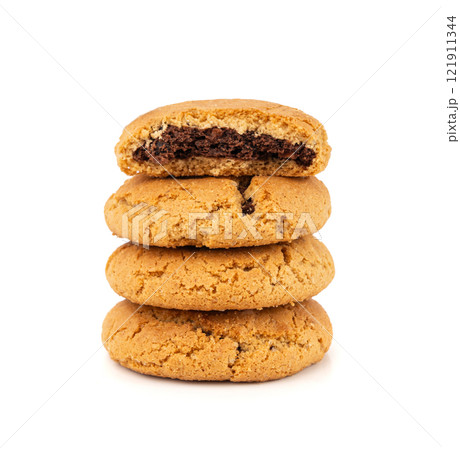 Chocolate cookies with chocolate filling isolated, brown round biscuits, broken sweet cocoa pastry 121911344