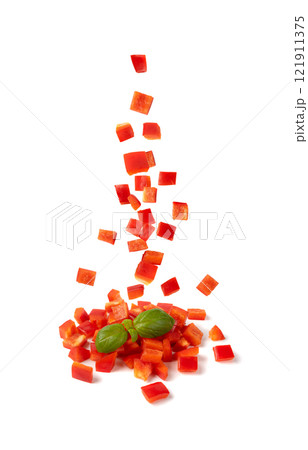 Falling Chopped paprika or red sweet pepper cuts isolated on white background 121911375