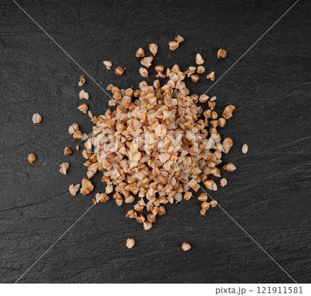 Boiled Buckwheat Pile on Black, Cooked Buck Wheat Grains, Porridge Heap, Cook Buckwheat Boiled Buckwheat Pile on Black, Cooked Buck Wheat Grains, Porridge Heap, Cook Buckwheat 121911581