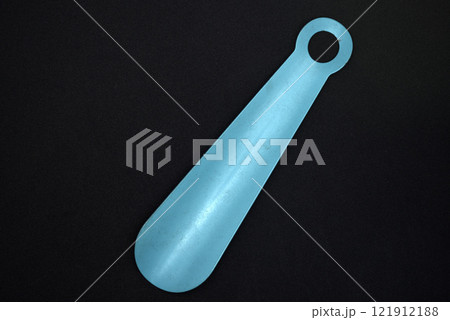 A shoe spoon. A tool for comfortable putting on shoes. 121912188