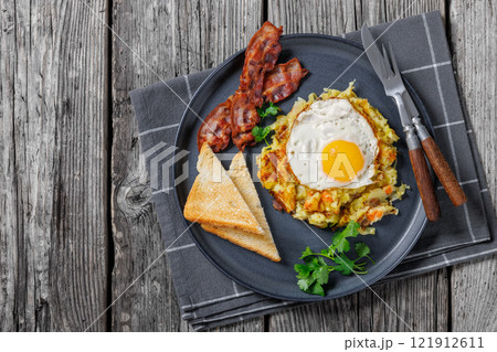 Bubble and Squeak with bacon, toasts, fried egg 121912611