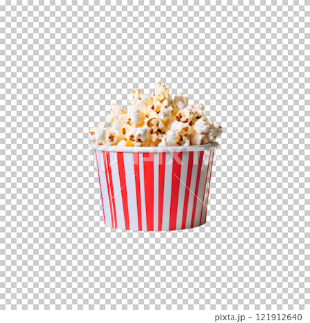 Freshly popped popcorn in a classic striped container ready for a movie night at home 121912640