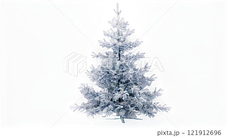 Snow covered artificial Christmas tree in a bright indoor setting during winter season 121912696