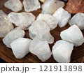White calcite crystals, handful of pretty stones, close up. Geology and mineralogy concept 121913898