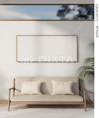 A beautiful minimalist living room featuring a wooden sofa and a picture frame mounted on the wall. A beautiful minimalist living room featuring a wooden sofa and a picture frame mounted on the wall. 121918563