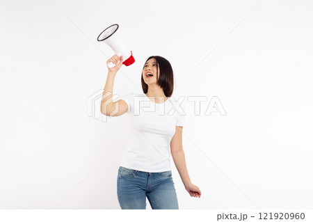 Asian woman smiling face holding megaphone shouting, posing isolated on white background, with copy space Asian woman smiling face holding megaphone shouting, posing isolated on white background, with copy space 121920960