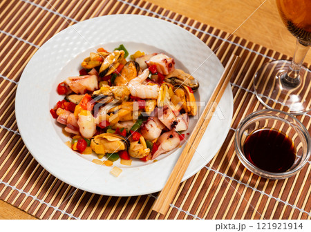 Popular Spanish appetizer, seafood salpicon, is served on plate. 121921914
