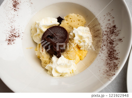 Modern deconstructed tiramisu with chocolate garnish Modern deconstructed tiramisu with chocolate garnish 121922948