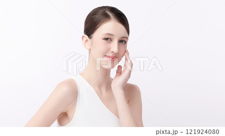 Beautiful young woman with clean fresh skin on white background, Face care, Facial treatment, Cosmetology, beauty and spa, women portrait. Beautiful young woman with clean fresh skin on white background, Face care, Facial treatment, Cosmetology, beauty and spa, women portrait. 121924080