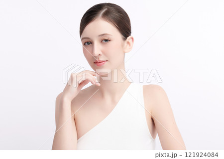 Beautiful young woman with clean fresh skin on white background, Face care, Facial treatment, Cosmetology, beauty and spa, women portrait. Beautiful young woman with clean fresh skin on white background, Face care, Facial treatment, Cosmetology, beauty and spa, women portrait. 121924084
