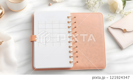 Planner and blank calendar setup with colorful stickers and motivational cards, top view 121924347