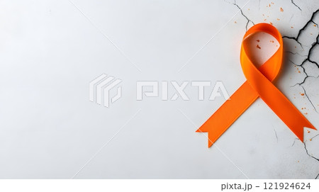 Creative cancer awareness concept with a 3D ribbon emerging from a cracked surface with light rays Creative cancer awareness concept with a 3D ribbon emerging from a cracked surface with light rays 121924624