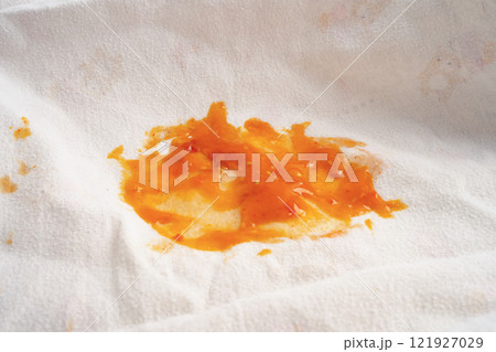 Dirty tomato sauce stain or ketchup on cloth to wash with washing powder, cleaning housework. 121927029
