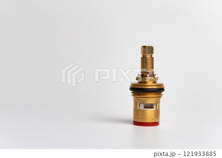 Water faucet-axle box with ceramic plates on a c background close-up macro photography Water faucet-axle box with ceramic plates on a c background close-up macro photography 121933885