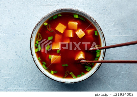 Tofu soup, Japanese cuisine. Miso soup with bean curd and green onions 121934002